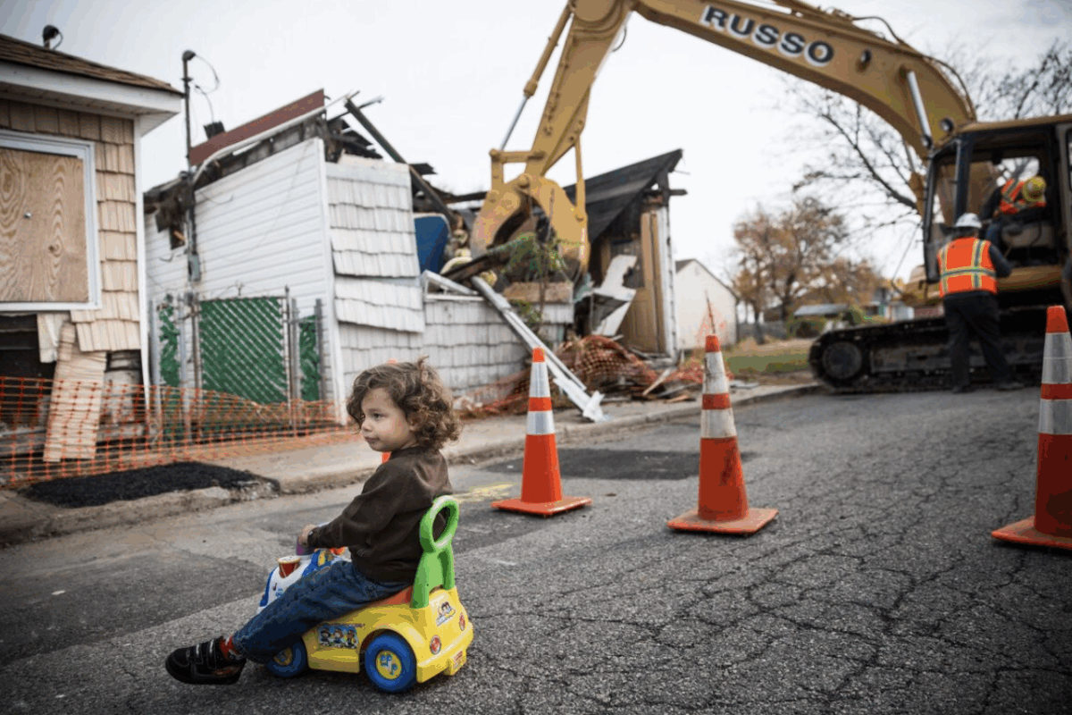 A home on Staten Island’s Oakwood Beach is demolished in 2014.Photographer: Andrew Burton/Getty Images